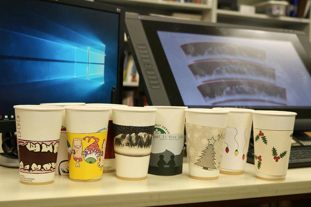 Creative student project supports food bank: Mount Si graphic designers design fundraiser coffee sleeves