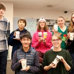 Creative student project supports food bank: Mount Si graphic designers design fundraiser coffee sleeves