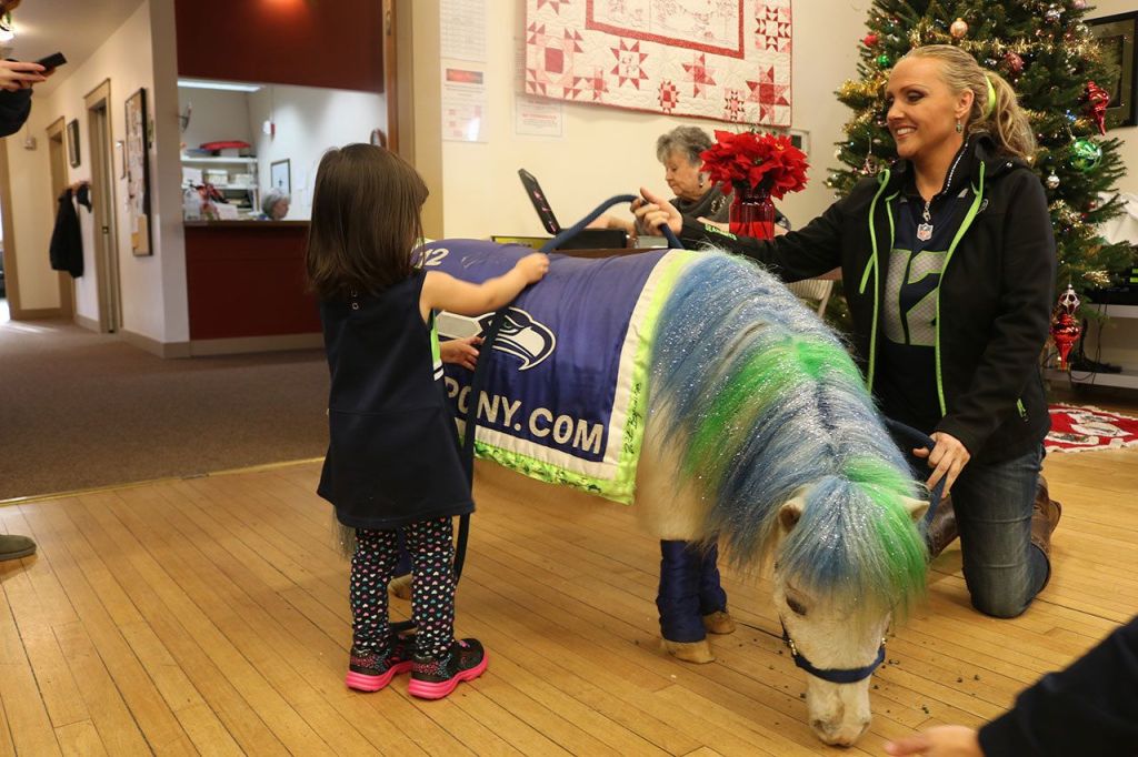 Tosha Young meets Wilson the 12th Pony. (Evan Pappas/Staff Photo)