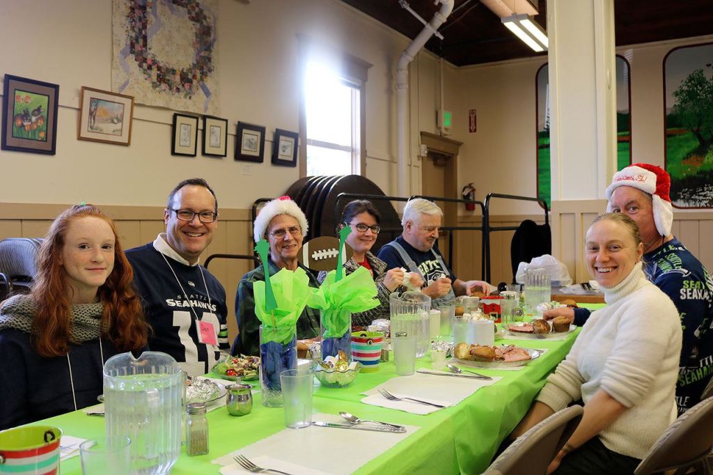 Event sponsors, senior center staff, and attendees, from left, Marlee Drew, Dan Drew, John Moore, Mairi Brooks, Terry Beedle, Mike Ethredge and Caroline Kogan. (Evan Pappas/Staff Photo)