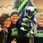 Seahawk, superfans, visit Carnation senior center during 12 Days of Goodness