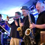 Jay Thomas and the Neo-Boogaloo Cats lit up the North Bend Jazz Walk Saturday with a brassy performance at Chaplins Chevrolet.                                Carol Ladwig/Staff Photo
