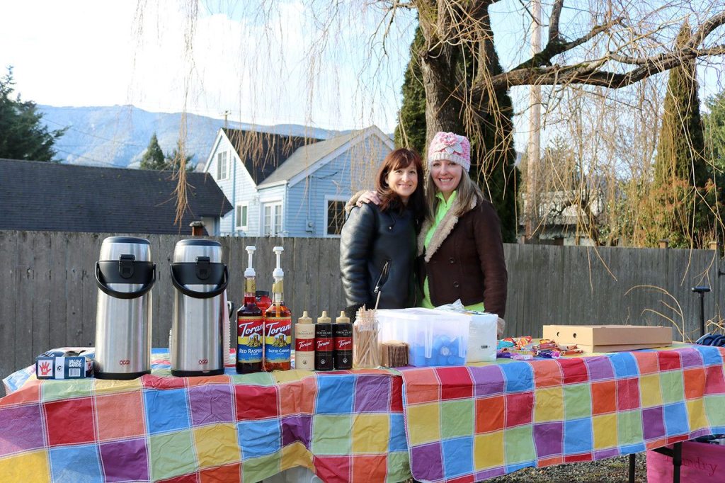 Trail Youth volunteers Kristen Zuray and Tonya Guinn pose for a photo before they begin their outreach work with Valley kids.                                Evan Pappas/Staff Photo
