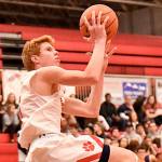 Freshman Jabe Mullins makes a big jump at the home game against Inglemoor on Jan. 6. (Courtesy of Calder Productions)