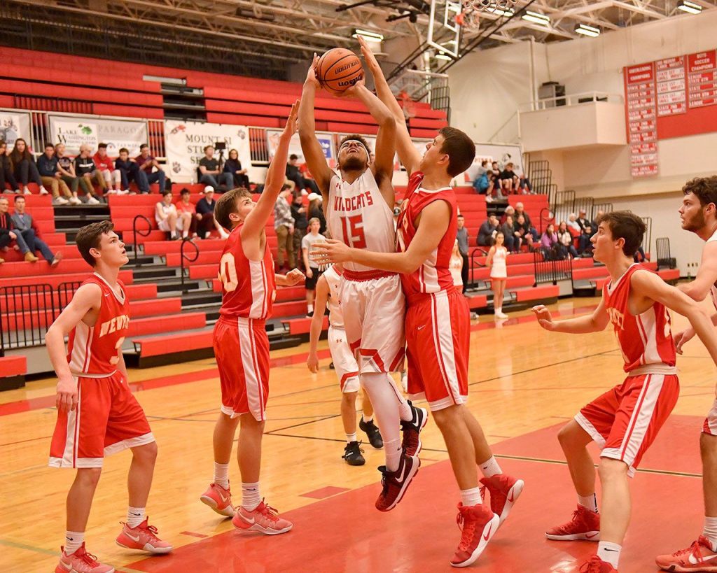 Mount Si boys pick up another win to stay alive in basketball’s post season