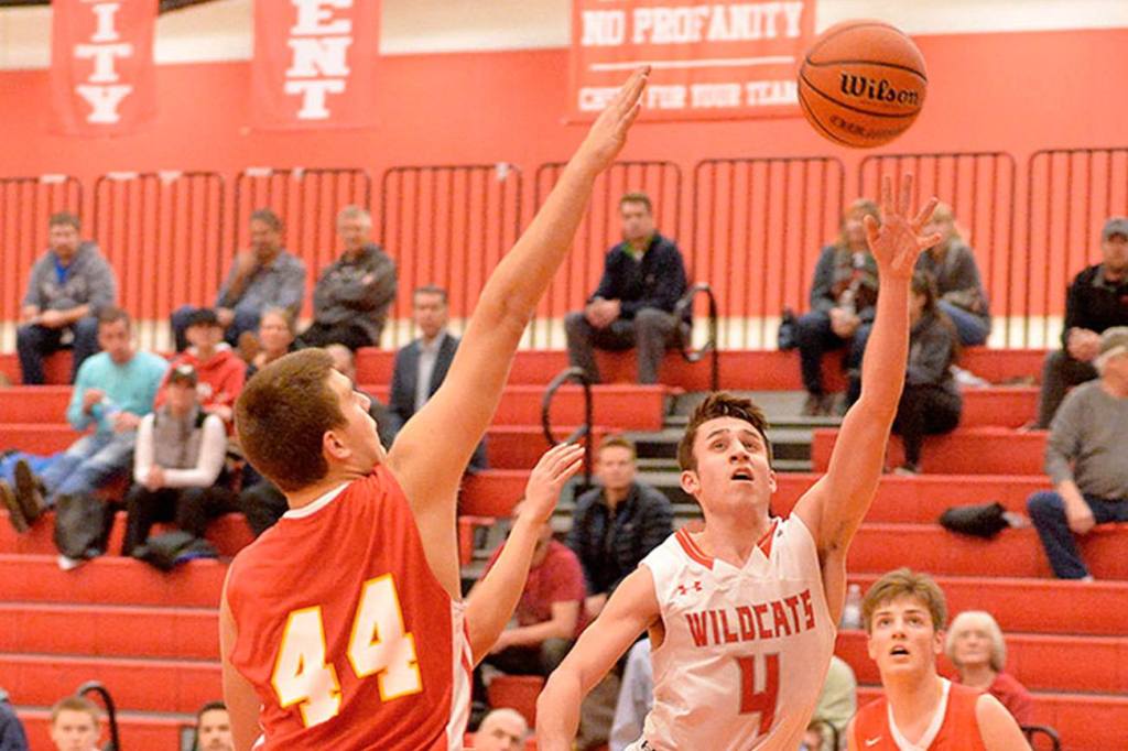 Mount Si boys pick up another win to stay alive in basketball’s post season