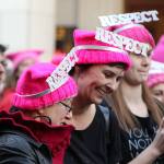 Women in pink hats demand respect, even as they march silently.                                Allison DeAngelis/Staff Photo