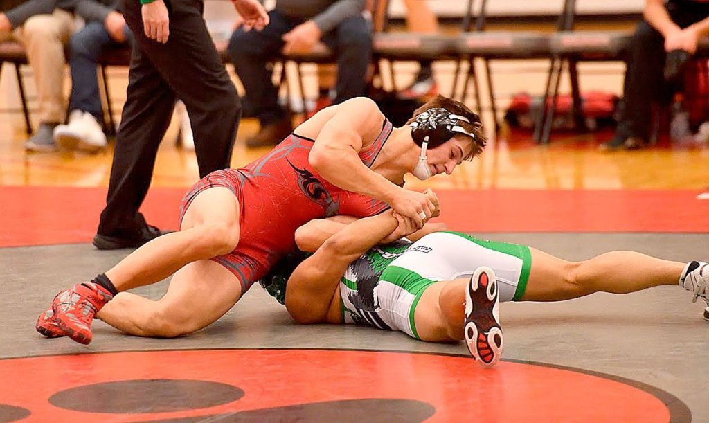 Photo courtesy of Calder Productions                                Mason Marenco works to pin Braulio Arroyo Jan. 19. Marenco won on a technical decision.