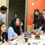 From left: Soha Fatima, Mariam Mohammad and Sana Qasim, check in participants before the presentations begin. (Evan Pappas/Staff Photo)