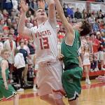 Photo courtesy of Calder Productions                                Senior Gavin Gorrell takes a foul as he goes up for a jump shot in Saturday&rsquo;s game against Woodinville.