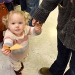 Mabel Stout offers a seed packet.                                Carol Ladwig/Staff Photo