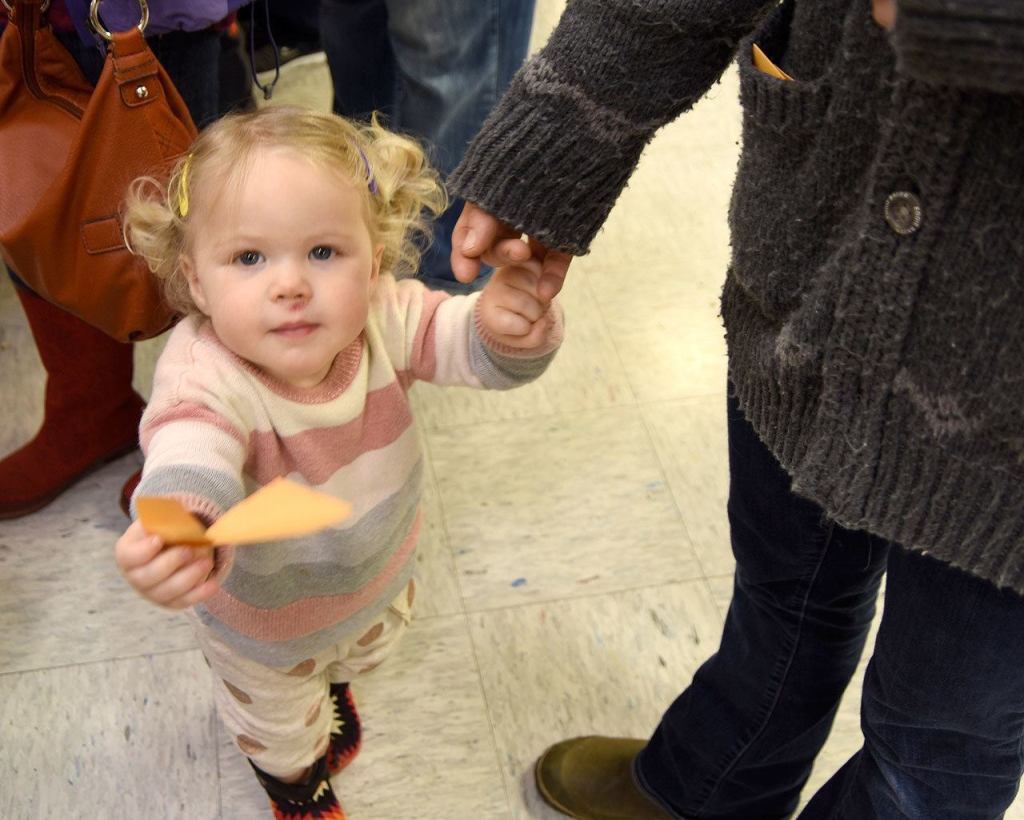 Mabel Stout offers a seed packet.                                Carol Ladwig/Staff Photo