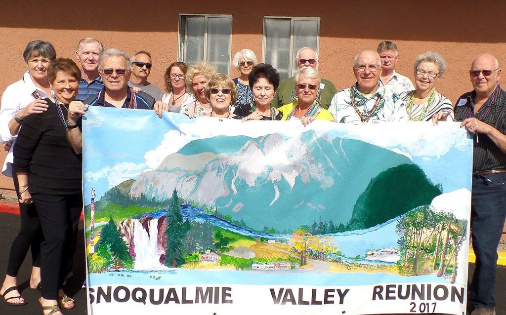 There were so many snowbirds attending the event, the group needed two photos to fit them all in.