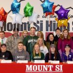 Mount Si High School athletes, along with their coaches and families, celebrated their future college scholarships Feb. 1, National Signing Day. Athletes pictured from left are Natalie Weidenbach, Jack Weidenbach, Ben Keller, Chaija Olsson, Lauren McCallum, Hannah Waskom and Mason Marenco.                                Courtesy Photo
