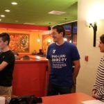 SNoqualmie Chamber of Commerce President Carolyn Simpson works with two volunteers to help make sure service is running smoothly during the fundraiser. (Evan Pappas/Staff Photo)