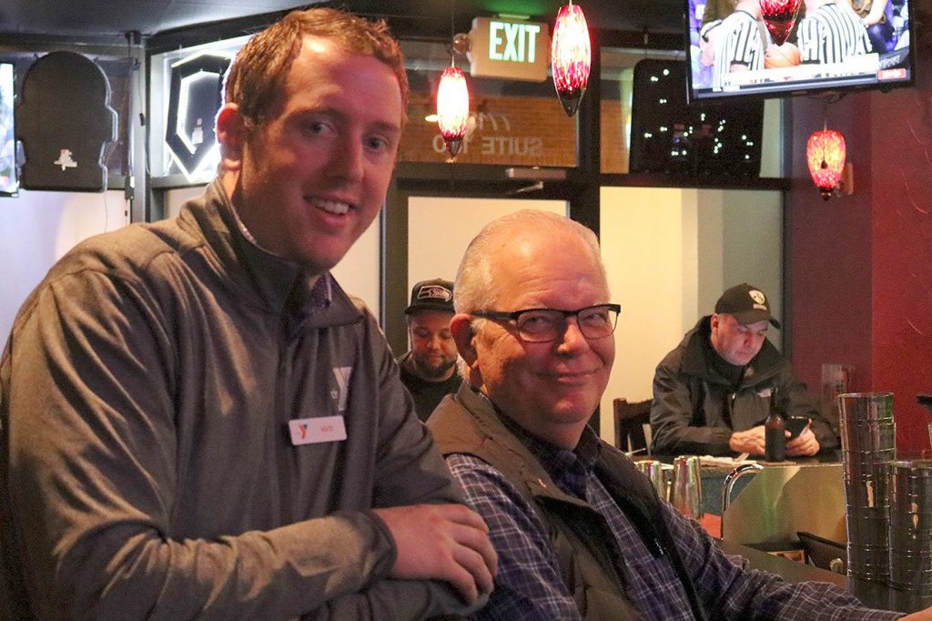 Snoqualmie officials serve up enchiladas, information at YMCA fundraiser