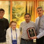Jose Nolasco was presented the Mayor&rsquo;s Lifesaving Award for saving Dorothy Schaan after she fell into Coal Creek. From left: Ed Borroff, who called 911, Schaan, Nolasco, and Mayor Matt Larson. (Evan Pappas/Staff Photo)