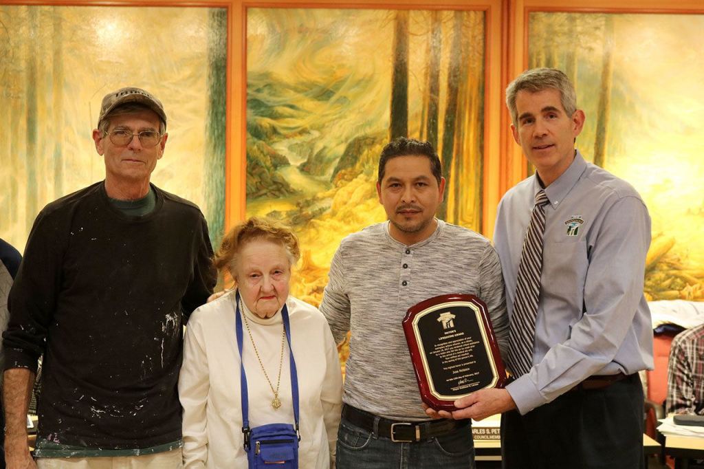 Jose Nolasco was presented the Mayor&rsquo;s Lifesaving Award for saving Dorothy Schaan after she fell into Coal Creek. From left: Ed Borroff, who called 911, Schaan, Nolasco, and Mayor Matt Larson. (Evan Pappas/Staff Photo)