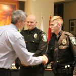 New Snoqualmie Police officers Brady Lanham and John Fishbeck take their oaths of office.