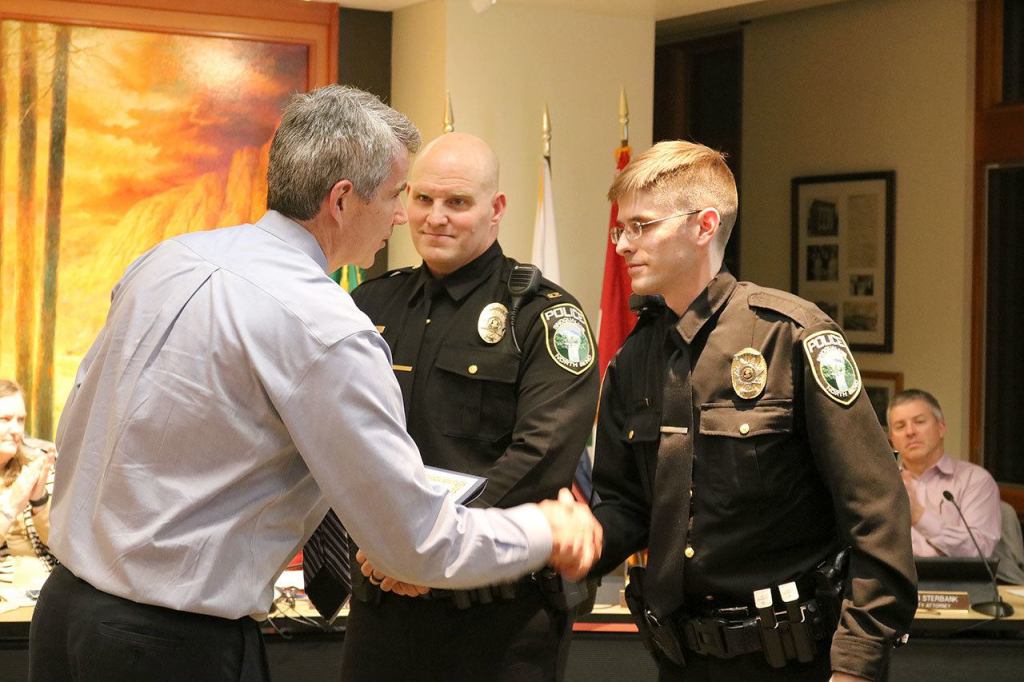 New Snoqualmie Police officers Brady Lanham and John Fishbeck take their oaths of office.