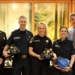 Fire Chief Mark Correira, far left, and Snoqualmie Mayor Matt Larson, far right, welcome three new volunteers to the Snoqualmie Fire Department, Peter O&rsquo;Donnell, Lori Jones and Kristina Myers. (Evan Pappas/Staff Photo)