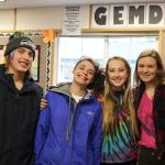 Kaden Kohnke, Makayla Haverfield, Jessi Bay and Anny Armour pose together at the clothing donation event. (Evan Pappas/Staff Photo)