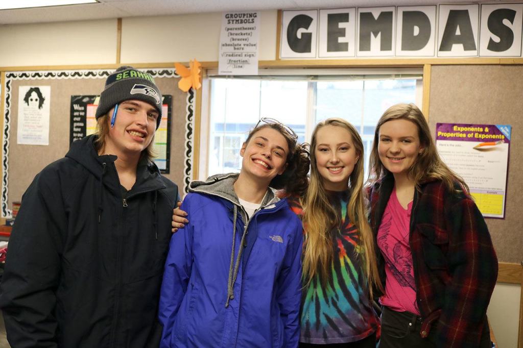 Kaden Kohnke, Makayla Haverfield, Jessi Bay and Anny Armour pose together at the clothing donation event. (Evan Pappas/Staff Photo)