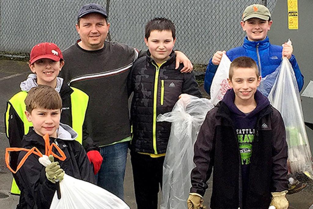 Local Scouts clean up trash on Lake Alice Road