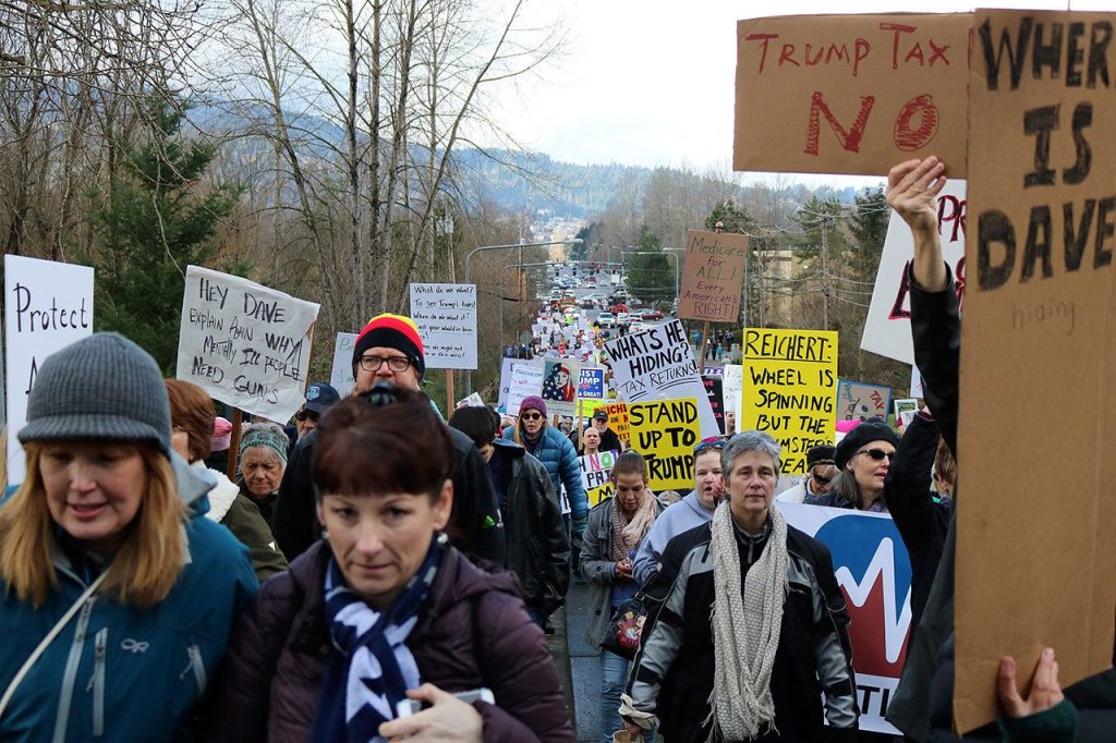 About 1,000 people marched to Congressman Dave Reichert&rsquo;s office on Southeast 56th Street. Nicole Jennings/staff photo