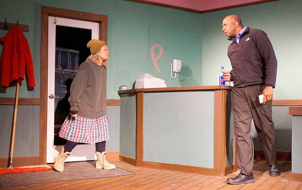 In a scene from &ldquo;Superior Donuts,&rdquo; Brynne Garman and Anthony Floyd confront each other in the donut shop.                                Photo courtesy of René Schuchter