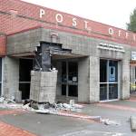 Damage to the canopy pillar at the entrance of the post office on E North Bend Way has closed the entry temporarily. (Evan Pappas/Staff Photos)