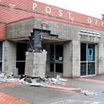 Car crashes into North Bend Post office entry; driver was uninjured