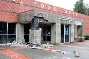 Car crashes into North Bend Post office entry; driver was uninjured
