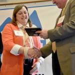 Brenna Vukovich accepts the Classified Educator of the Year award from Snoqualmie Valley School District Superintendent Joel Aune March 23 at the Snoqualmie Valley Schools Foundation luncheon. Carol Ladwig/Staff Photo