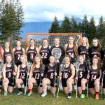 The Mount Si High School girls lacrosse team includes, from left: kneeling - Misa Kalvelage, Alyssa Martin, Molly Wyrsch, Kami Smith, Emily Blankenburg, Jessica Morris, Gracee Gorrell, Izzy Alati, Sydney Gabel, and Lauren Duvall; and standing - Coach Christy Clinton, Esther Litwack-Lang, Gabi Krueger, Keira Mix, Karly Barlow, Riordan Roche, Tessa Lewis, Sam Smith, Maia Rezoski, Lily Nordby, Jackie Stone, and Chianne Gudaitis.