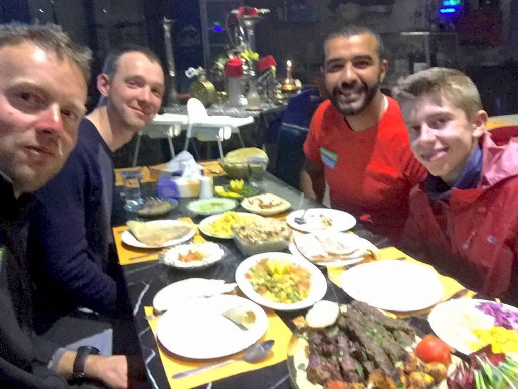 Matt Loveland, Andy Nurse, Jawad Abu Rumman, and Jack Mandelkorn, stop at a restaurant for some food. (Courtesy Photo)