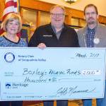 Boxley Music Fund, also known as Jazz Clubs NW, was one of the community organizations to be awarded a 2017 Rotary Grant. Rotary members Nancy Whitaker, left, and President Jeff Mumma, right, presented the award to Jazz Clubs NW Executive Director Gregory Malcom March 23.                                Courtesy Photo