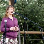 Parade organizer Betsy MacWhinney thanks all the parade participants for attending the first ever March of the Vegetables Saturday in Duvall.                                Carol Ladwig/Staff Photo