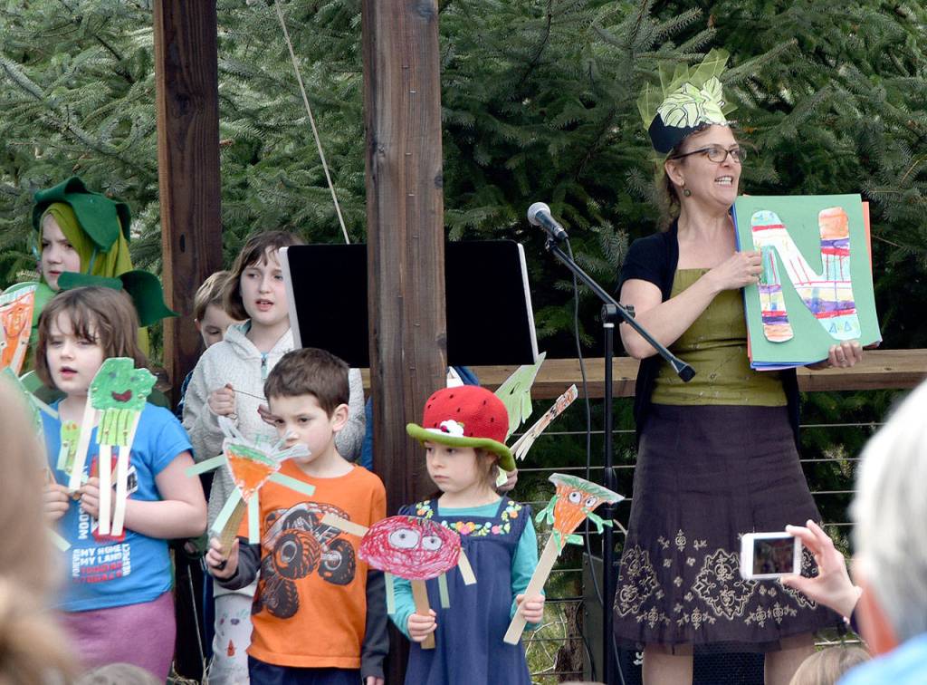 Students from Eagle Rock School performed &ldquo;The Vegetable Song,&rdquo; Saturday at Depot Park.                                Carol Ladwig/Staff Photo