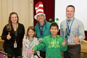 Opstad Elementary students winning bikes in the North Bend Masonic Lodge&rsquo;s Bikes for Books program this year are Emma Gorski, second grade, and Binh Danielson, third grade, pictured with, from left, Opstad Assistant Principal Katelyn Long, Librarian Nancy Huestis, and Principal Ryan Hill.                                Courtesy Photo