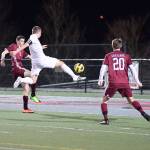 Cameron Dwight leaps into the air to take a big shot on the Eastlake goal. (Photo courtesy of Calder Productions)