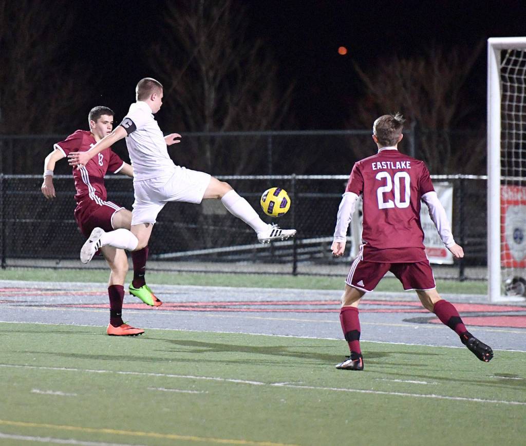 Cameron Dwight leaps into the air to take a big shot on the Eastlake goal. (Photo courtesy of Calder Productions)