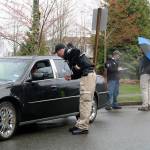Snoqualmie Police Officer Chad Ridout questions a community volunteer, who was playing the role of a registered sex offender during a child abduction training exercise last Thursday on Snoqualmie Ridge. During the exercise, police investigated this suspect but found he was not the culprit. (Evan Pappas/Staff Photo)