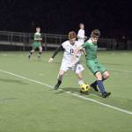 Kyle Hunter fights for the ball in the second half. (Photo courtesy of Calder Productions)