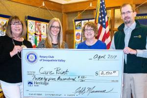 Pictured left to right is Rotarian Charlotte Jacobs, Emily Ridart, Val Orton of Care Point and Rotary President Jeff Mumma.                                Courtesy Photo