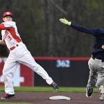 Mason Marenco reaches for the ball to tag out a Decatur runner Saturday at Bannerwood Park. Photo courtesy of Calder Productions