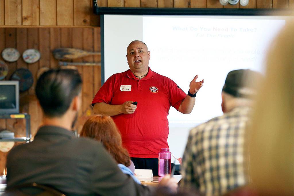 Tim Perciful, fire and life safety instructor at Mount View Fire and Rescue, gives a presentation at a Firewise drill event. (Courtesy Photo)