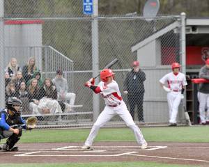 Carson Corra steps to to bat at the temporary home field of Mount Si High School, Bannerwood Park in Bellevue. (Photo courtesy of Calder Productions)