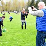 Rob Hinkle captures every minute of his son, Danny&rsquo;s exploits at Snoqualmie&rsquo;s egg hunt at Centennial Fields Saturday. Carol Ladwig/Staff Photo