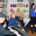 Musicians Chris Clark and Bob Hammer with singer Jennifer Kienzle filled a cozy space at Birches with jazz.                                Mary Miller Photo